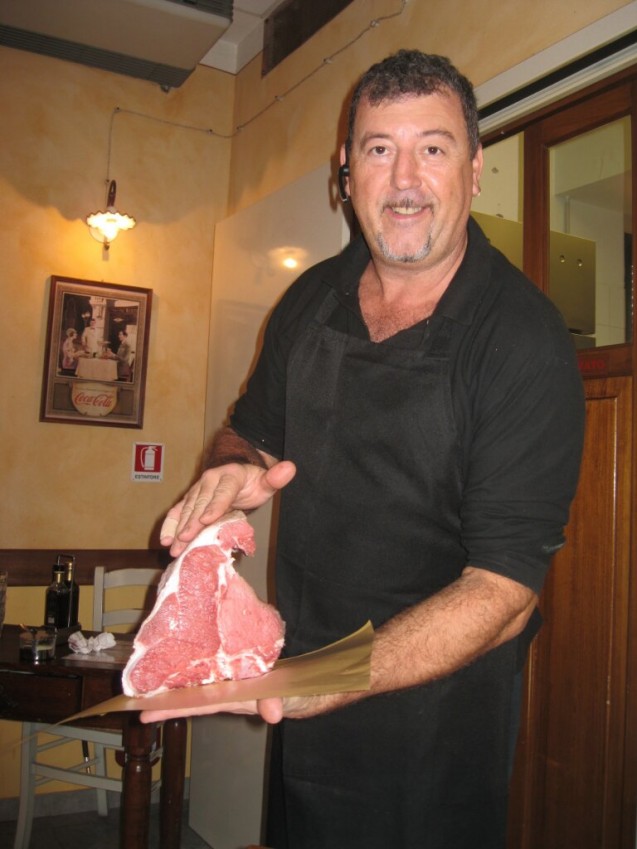 Andrea presents with pride a bistecca all fiorentina