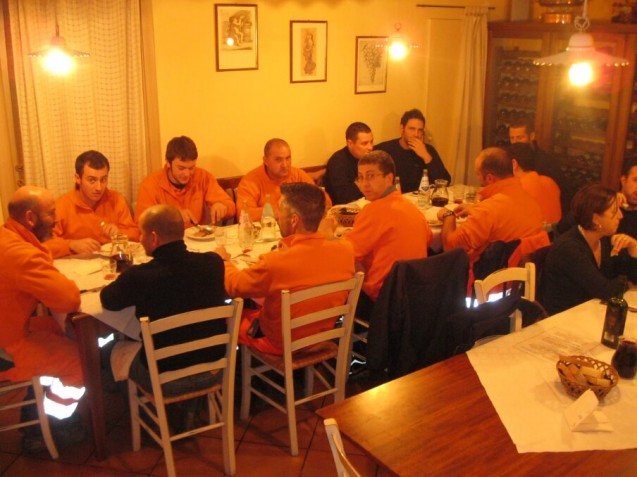 Orange-suited workers feast