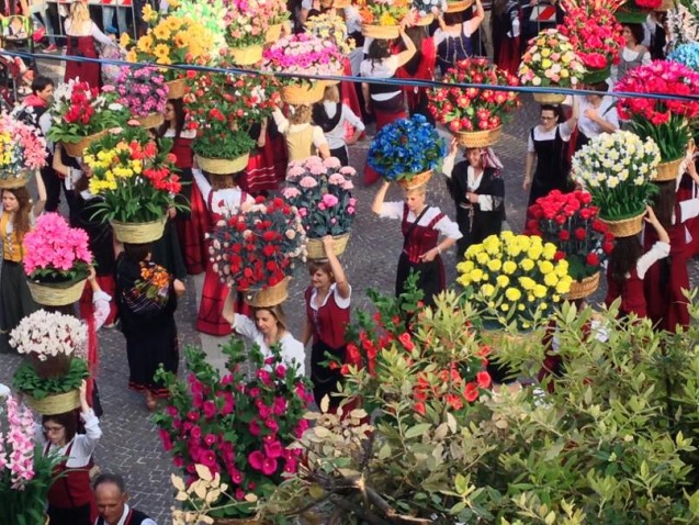 Parading wih dignity, floral arrangements on head